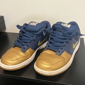 Nike SB Dunk Low Supreme Swoosh Gold